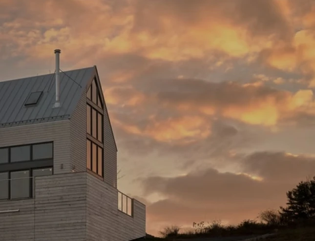 A modern home at sunset